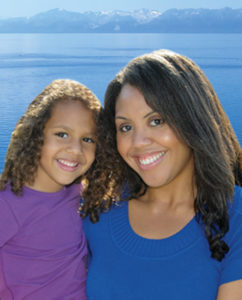 Daughter and mom smiling in 